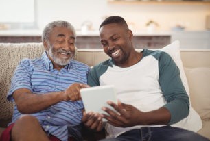 image of two people smiling