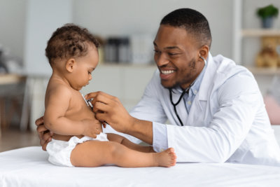 Doctor Doing Check Up to a baby